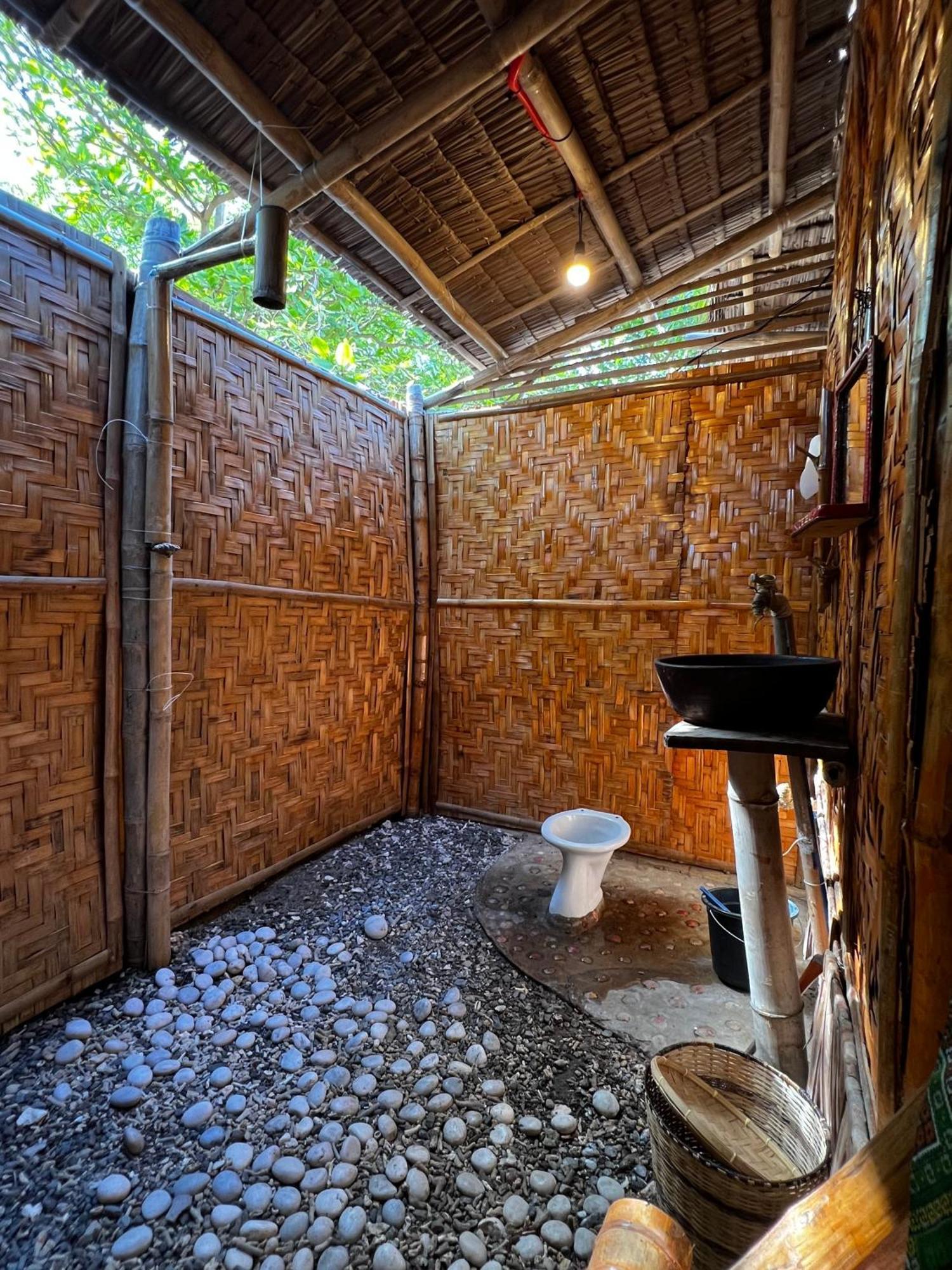 Tribal Huts Community Hostel Daanbantayan Phòng bức ảnh